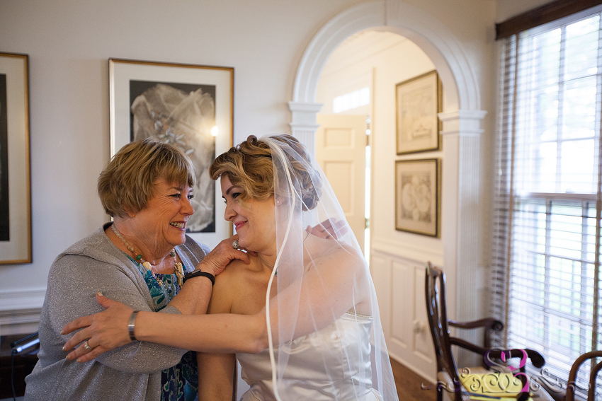 12 - bride and mother of groom smile lawrence wedding photographer