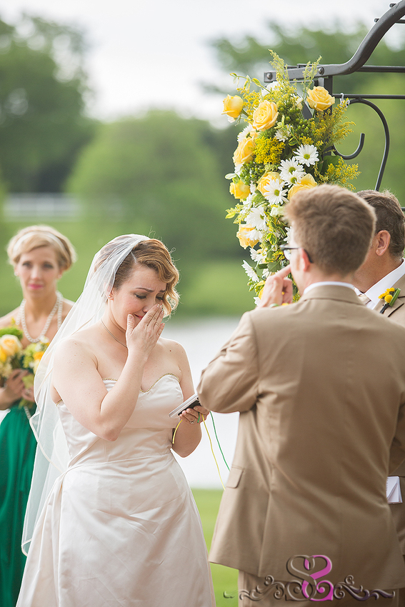 31 - bride cries reading vows during ceremony lawrence wedding photographer
