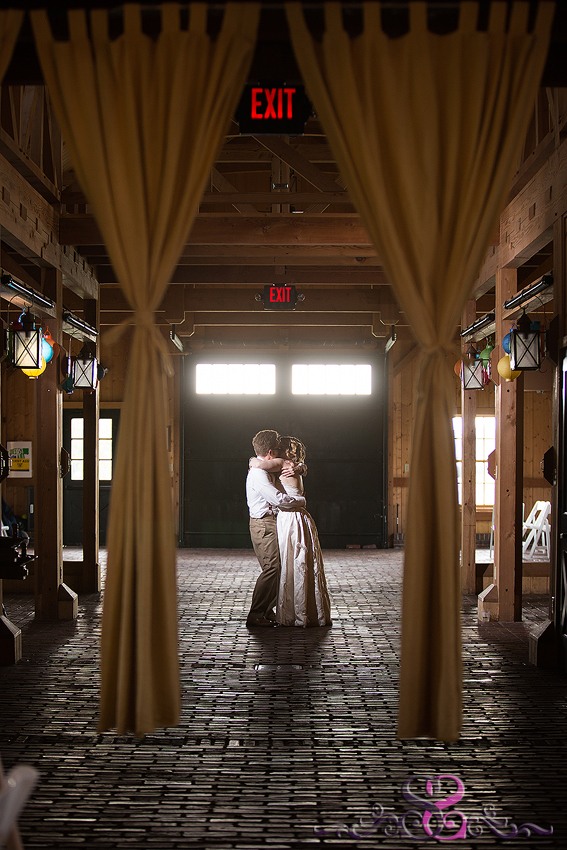 62 - bride and groom kiss in dramatic light kansas photographer
