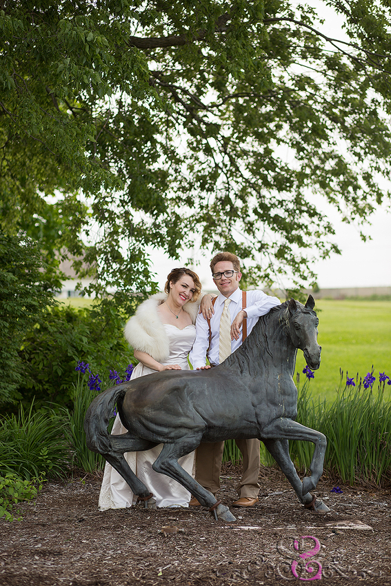 70 - bride and groom with horse statue mildale farms edgerton kansas