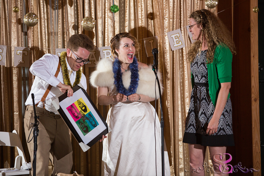 75 - smiling bride and groom with pop art painting kansas city wedding photographer