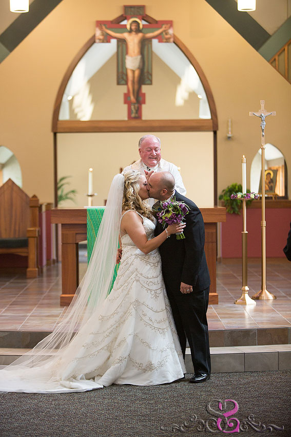 23-bride-and-groom-share-first-kiss-lawrence-wedding-photographer