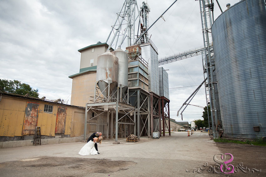 37-bride-and-groom-dip-kiss-in-industrial-area-michigan-photographer
