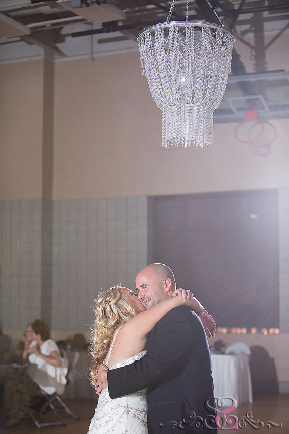 43-bride-and-groom-first-dance-under-chandelier-michigan-photographer