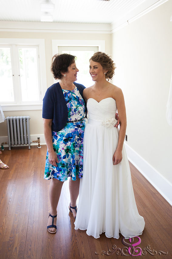 11-mom and bride hug michigan wedding photographer