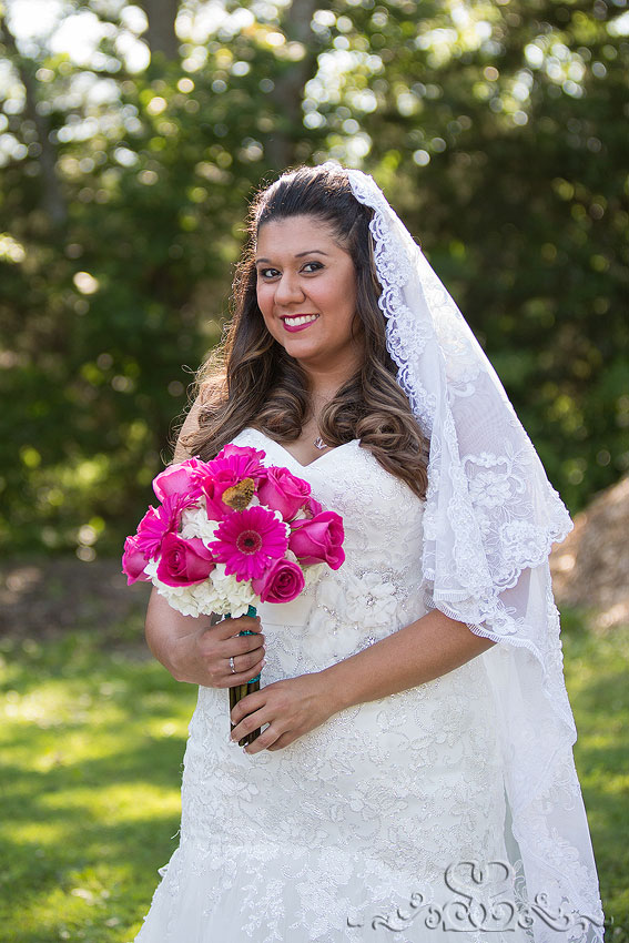 14-bride-smiles-with-pink-bouquet-and-veil-lawrence-wedding-photographer