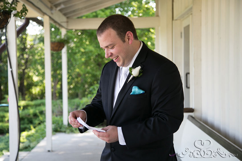 15-groom-opens-gift-from-bride-lawrence-wedding-photographer
