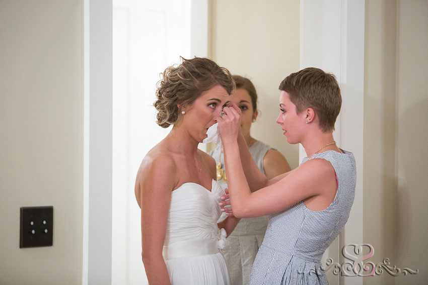 20-bridesmaid dries brides tears grand rapids photographer