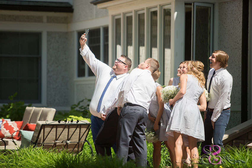 25-wedding party takes selfie before ceremony lawrence wedding photographer