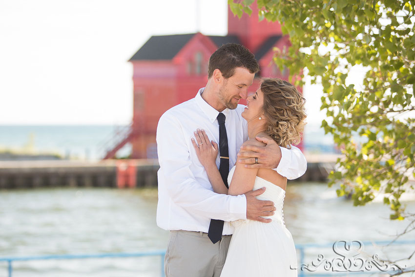 46-bride and groom in front of lighthouse holland michigan photographer