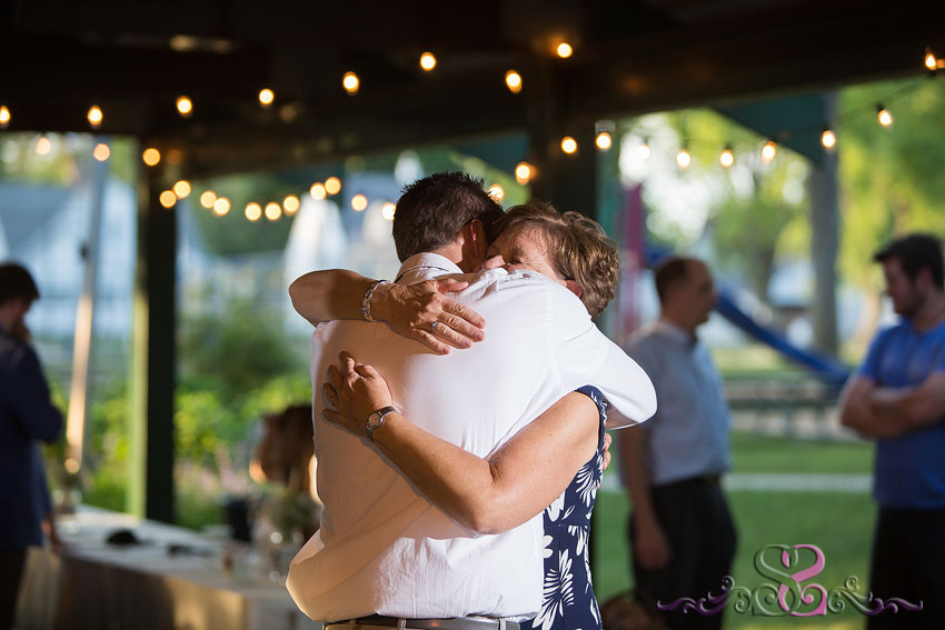 58-groom hugs mother during dance holland michigan photographer