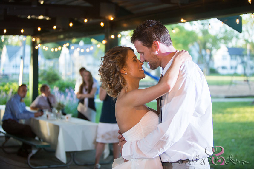60-bride and groom share first dance michigan wedding photographer