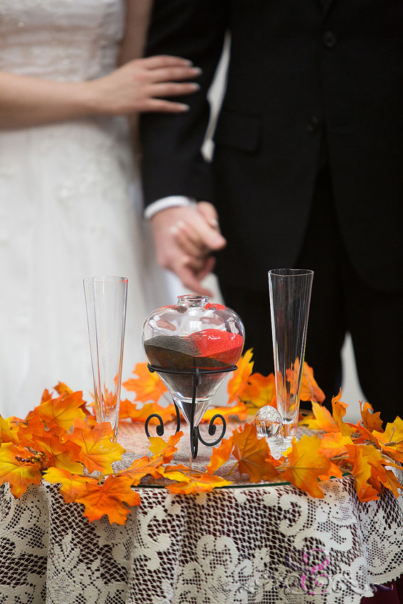 21-closeup-of-red-and-brown-sand-ceremony-michigan-wedding-photographer