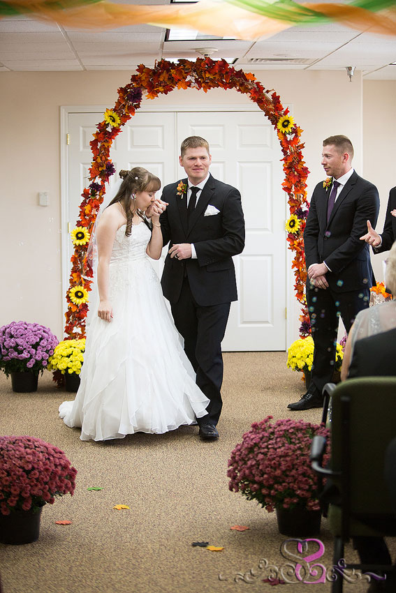 24-bride-kisses-groom-during-ceremony-michigan-wedding-photographer