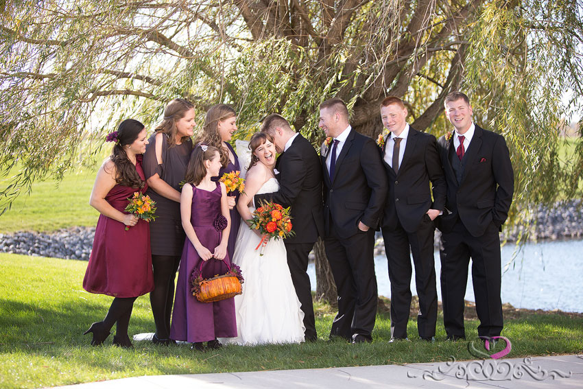 30-bridal-party-smiles-at-bride-and-groom-michigan-wedding-photographer-Fall-Wedding-at-Waterford-Crossing-Goshen-IN