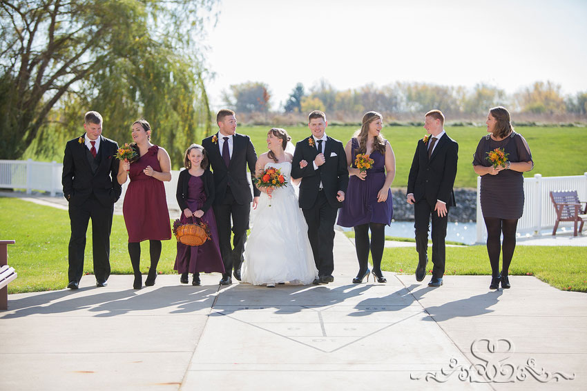 31-bridal-party-walks-on-sidewalk-michigan-photographer