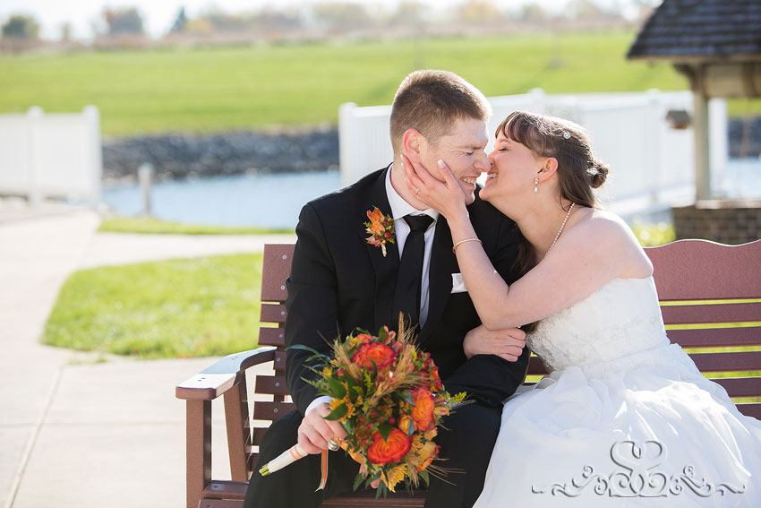 42-bride-and-groom-giggle-on-bench-destination-wedding-photographer