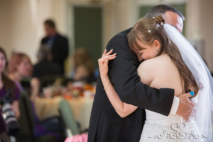 48-bride-hugs-dad-during-first-dance-destination-wedding-photographer