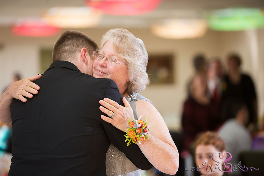 50-mother-hugs-groom-destination-wedding-photographer